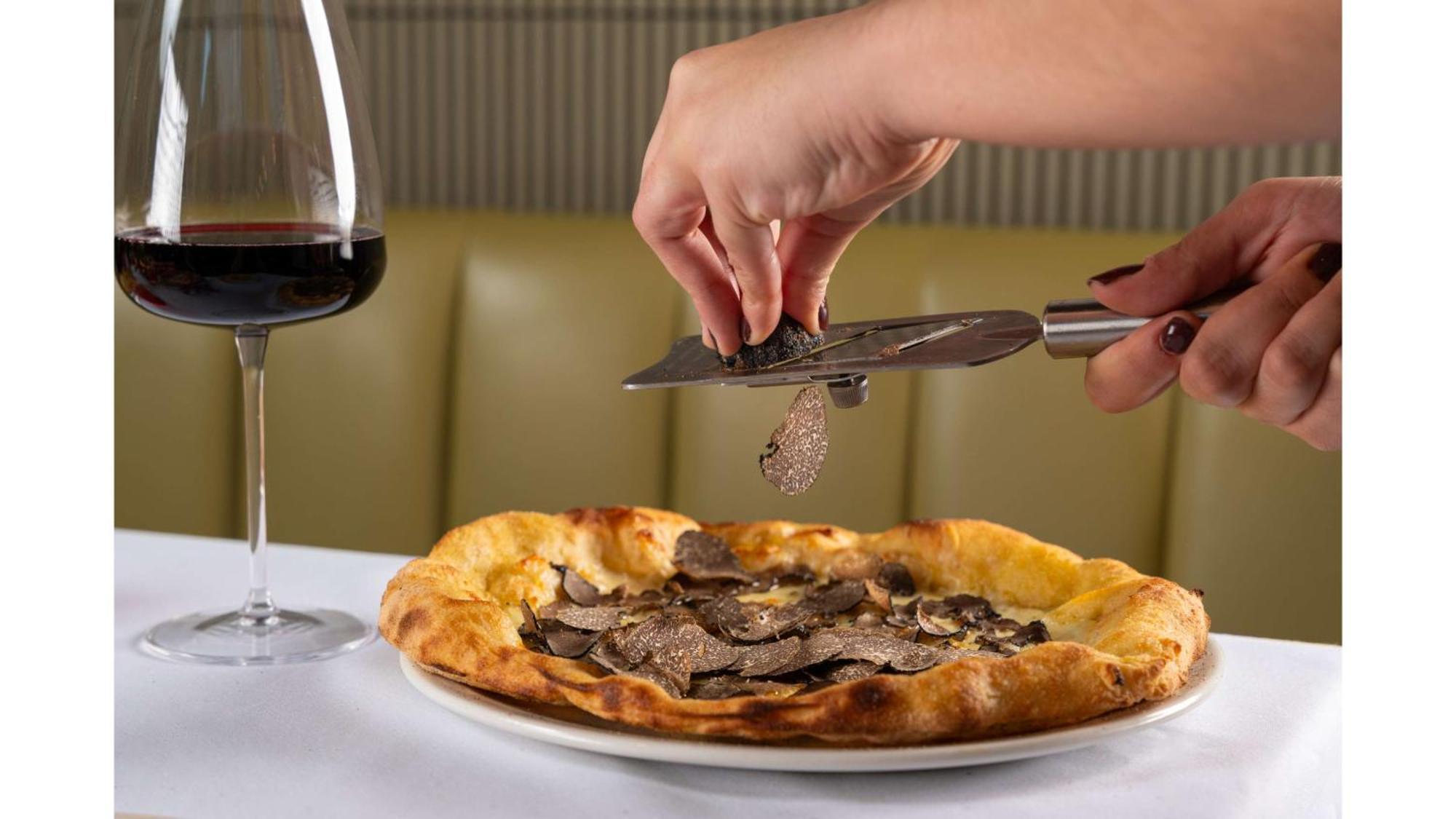 Art'Otel London Battersea Power Station, Powered By Radisson Hotels Extérieur photo A truffle being shaved over a pizza